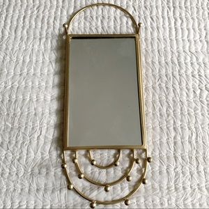 Mini wall mirror and necklace storage